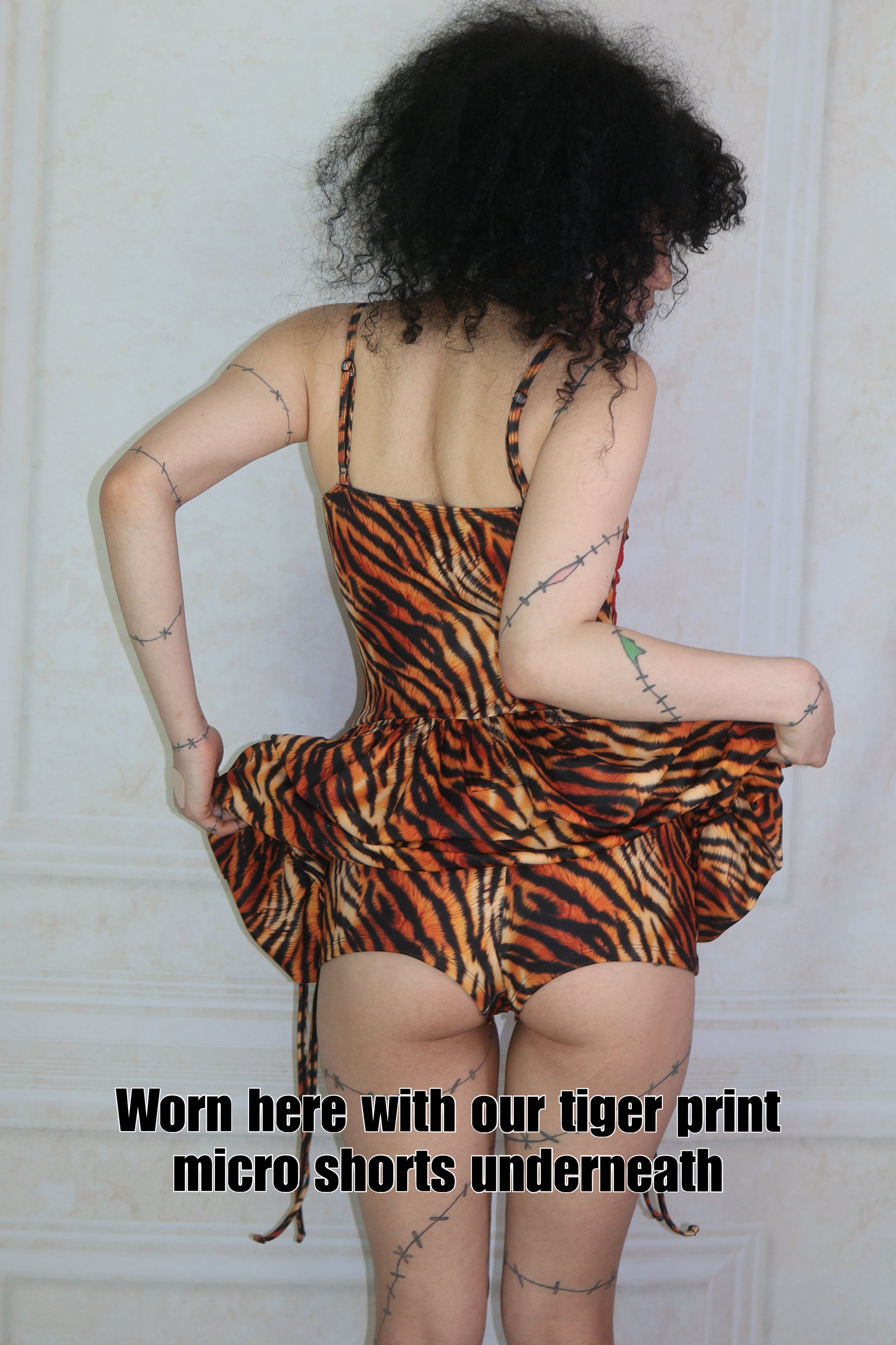 Tiger print ruffle mini dress